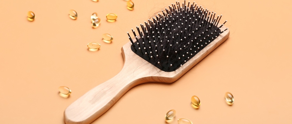 Do Vitamin Supplements Really Combat Hair Loss?